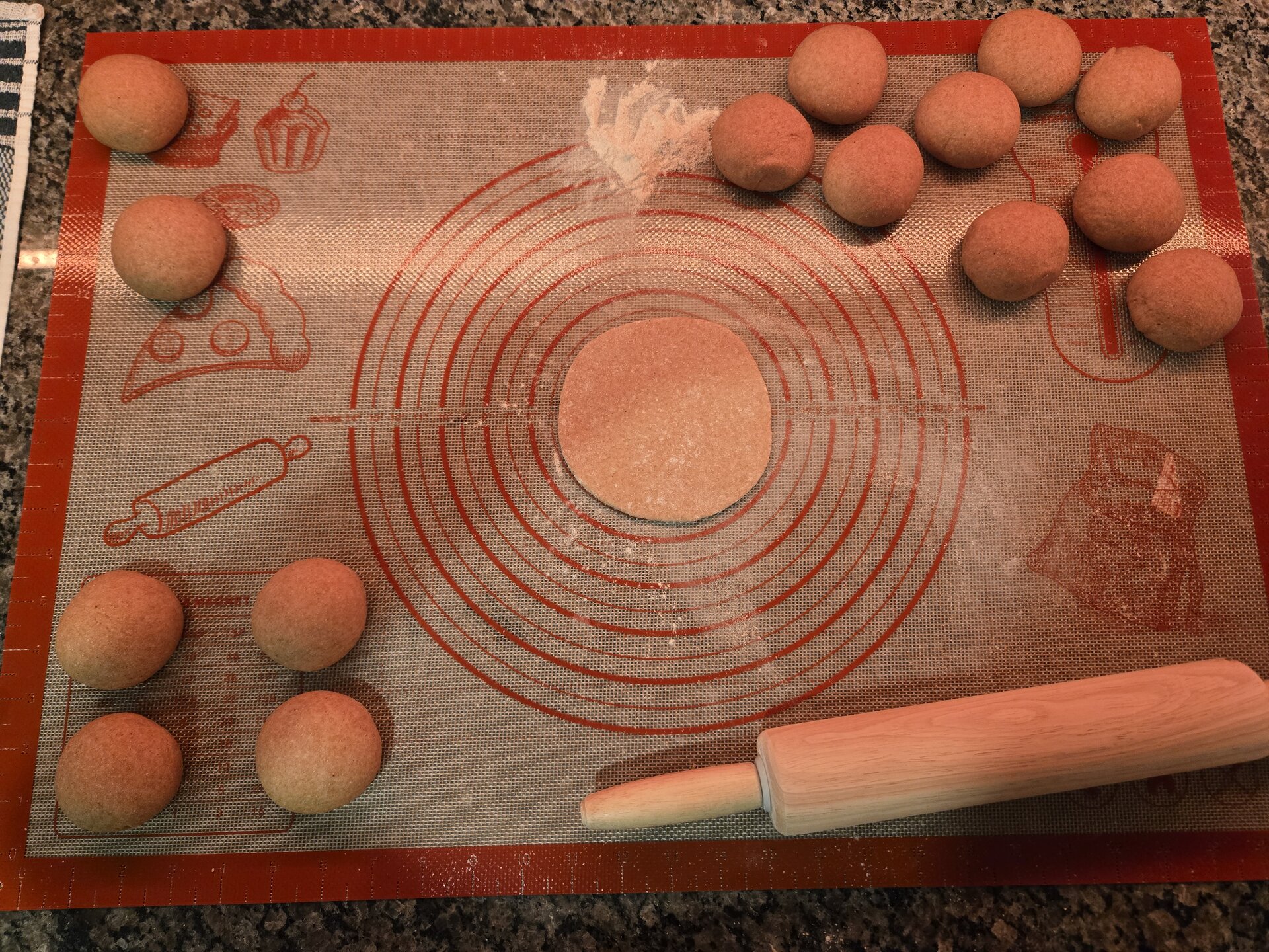 Rolling out pita dough