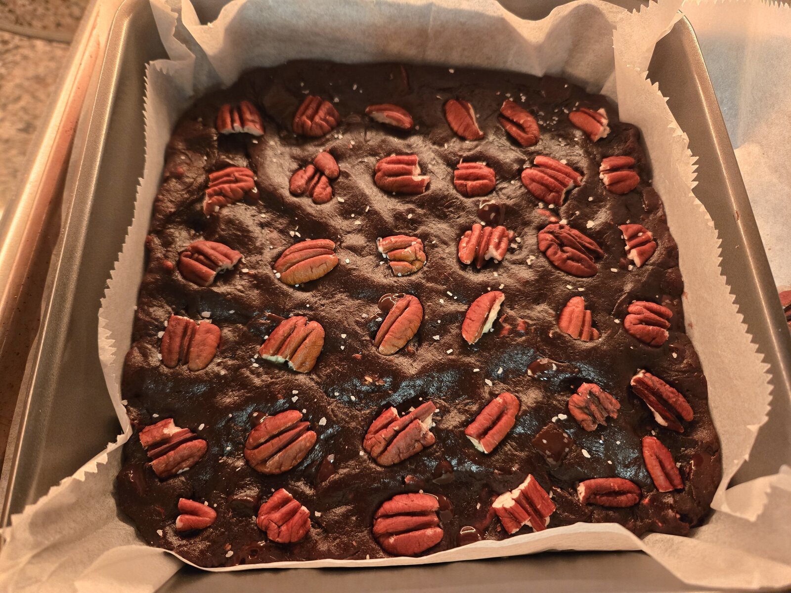 Baked dates brownies with pecans and salt